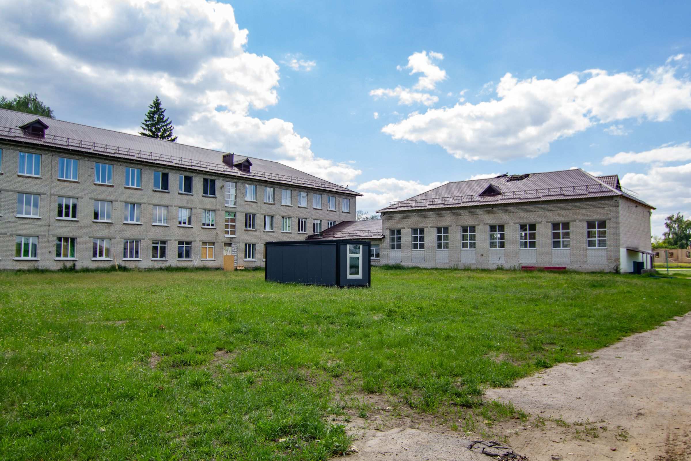School buildings on a grassed campus