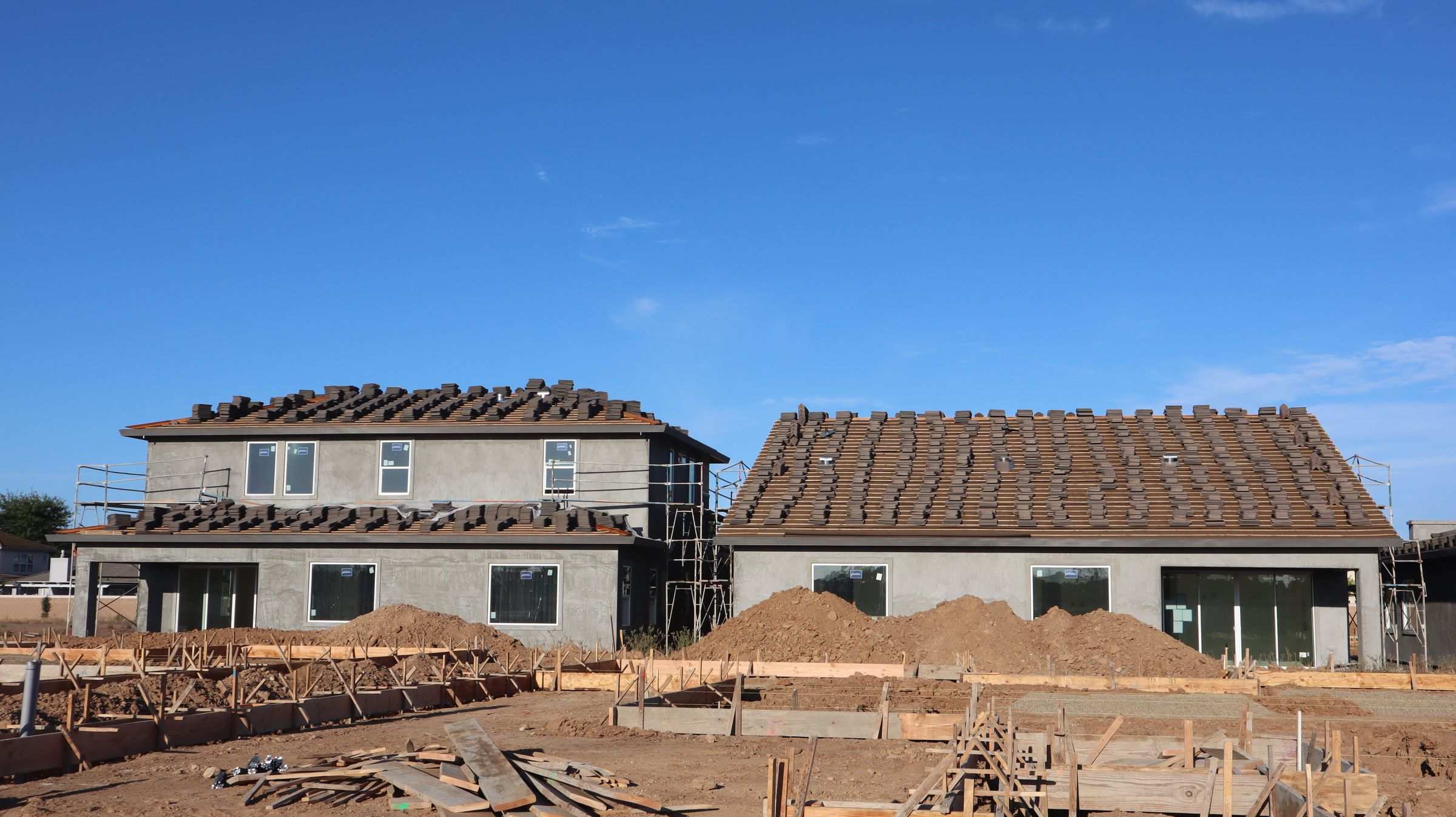 New houses under construction with scaffolding
